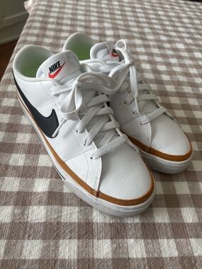 Nike Women’s White Sneakers with Black Swoosh and Brown Trim